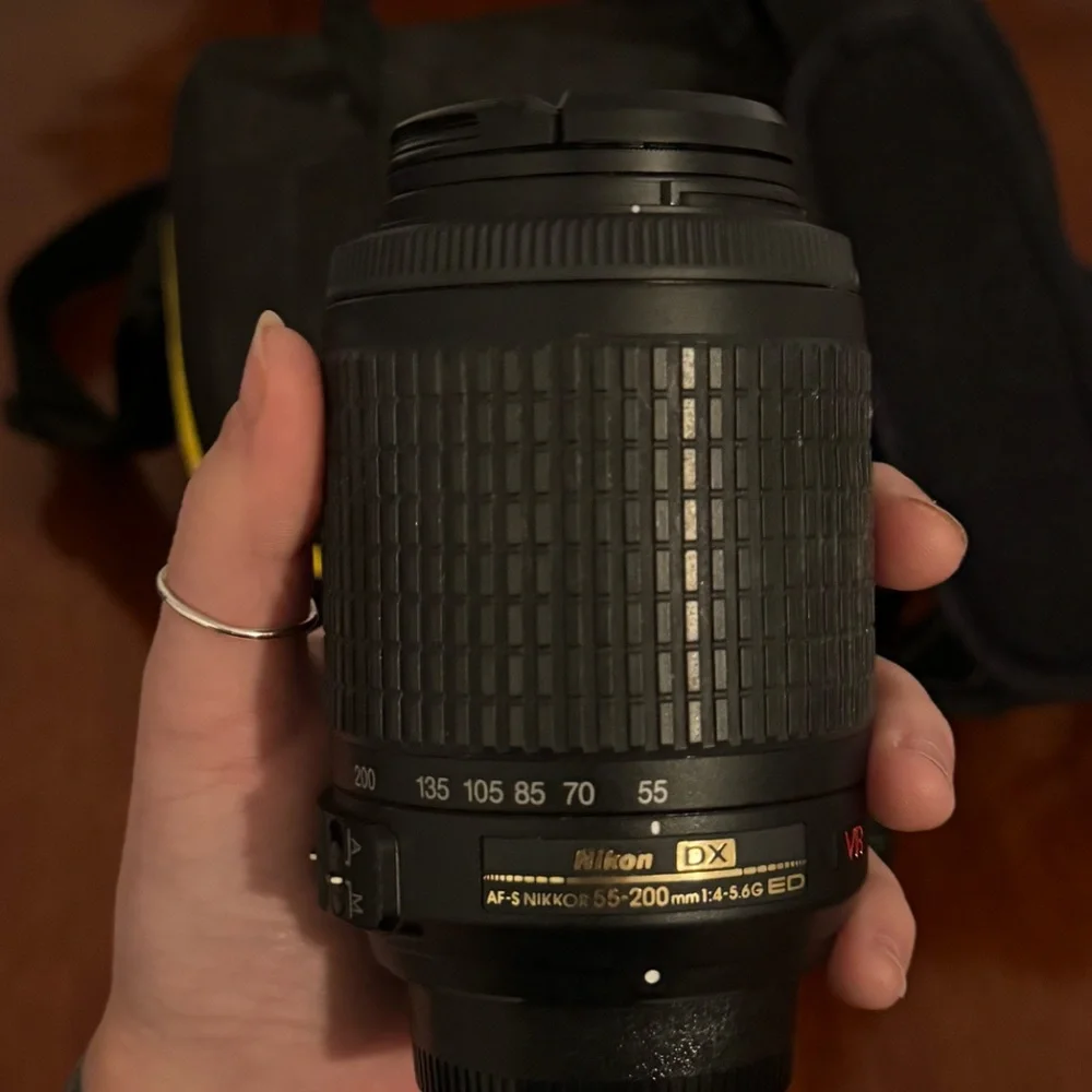 Nikon D3100 with 18-55mm lens + 55-200mm lens